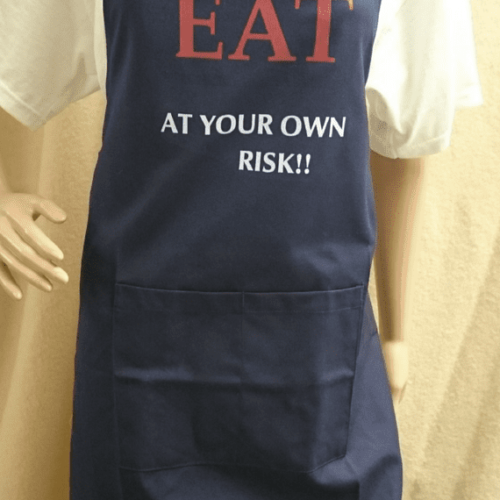Adult Novelty Bib Apron in ‘Eat At Your Own Risk’ design